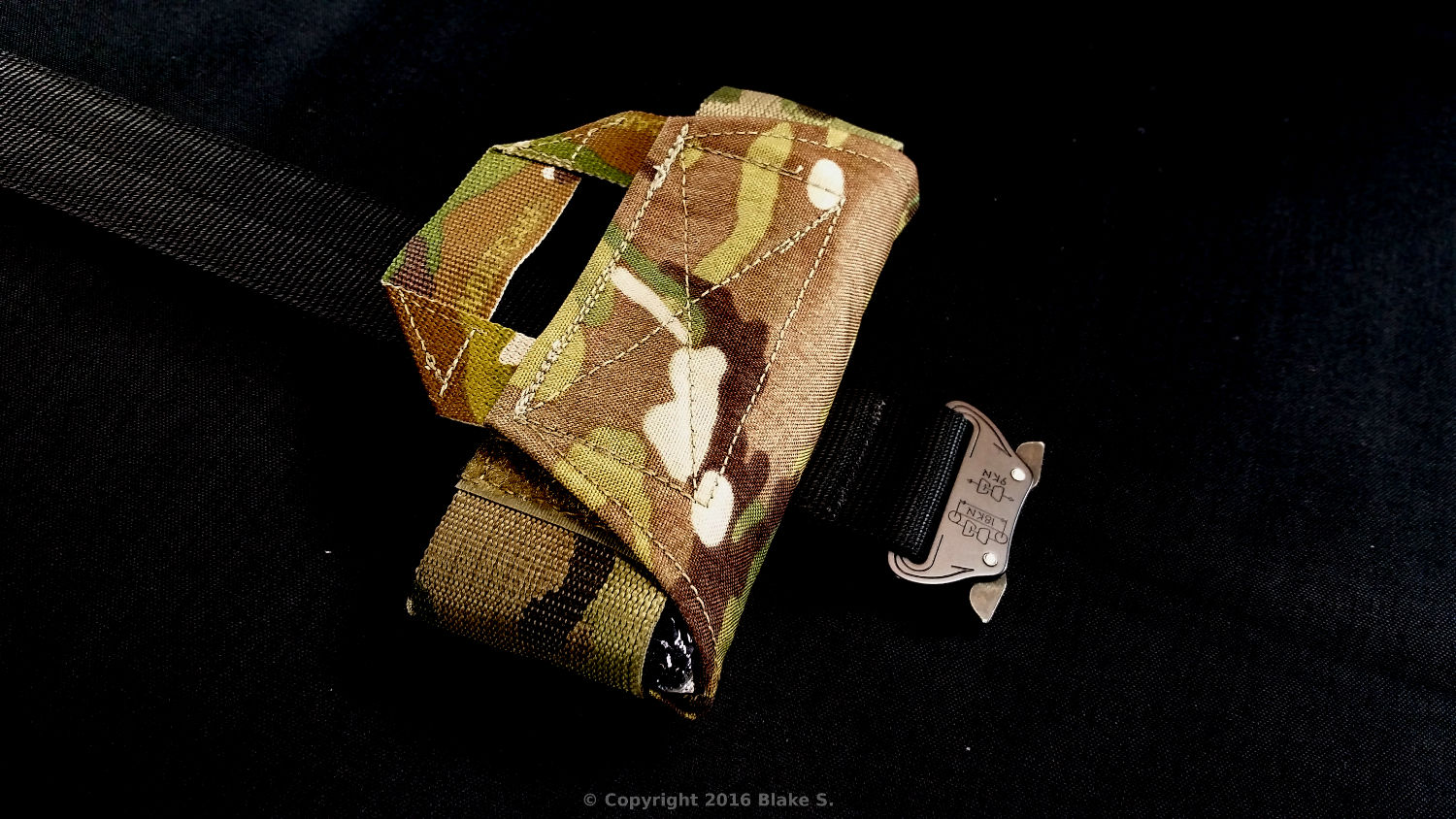 Omnimount Tourniquet Pouch by Omnitac. Can be mounted vertically, horizontally, Velcro, or on a belt. Shown in Multicam.